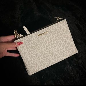 Authentic White Michale Kors Cross Body. Purchased in store.